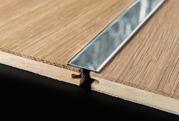 Stainless Steel T Bar 25mm 
 Spacers & Tiles and Wooden Flooring 
 Keywords: Tom Hampson Photography Spacers tiles wood flooring bathroom toilet bath shower commercial photography Visual Eye Visualeye Creative Interiors product studio high wycombe exteriors Ruislip accessories tile floor bathroom bar floor dog