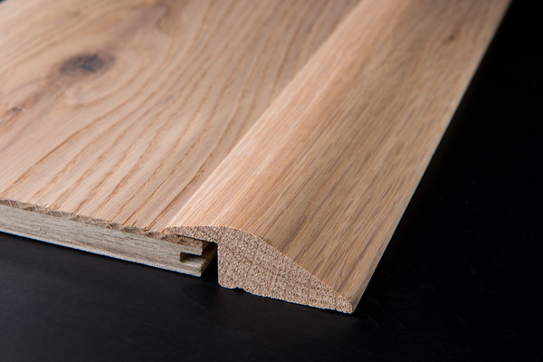 Oak Threshold Fitted 
 Keywords: Tom Hampson Photography Spacers tiles wood flooring bathroom toilet bath shower commercial photography Visual Eye Visualeye Creative Interiors product studio high wycombe